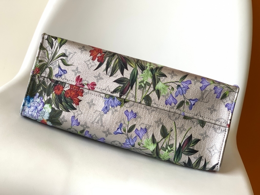 OnTheGo MM Mini Tek Omuz Çantası Markalı M81724 Çiçek Desenli Gümüş Kaplı Kanvas